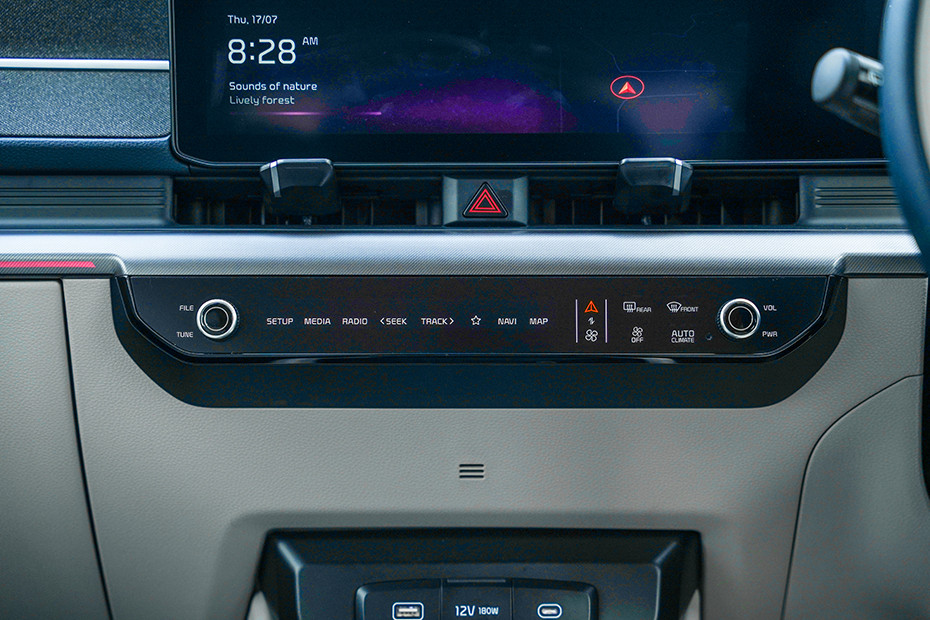 Kia Carens Clavis EV Switches In Centre Console